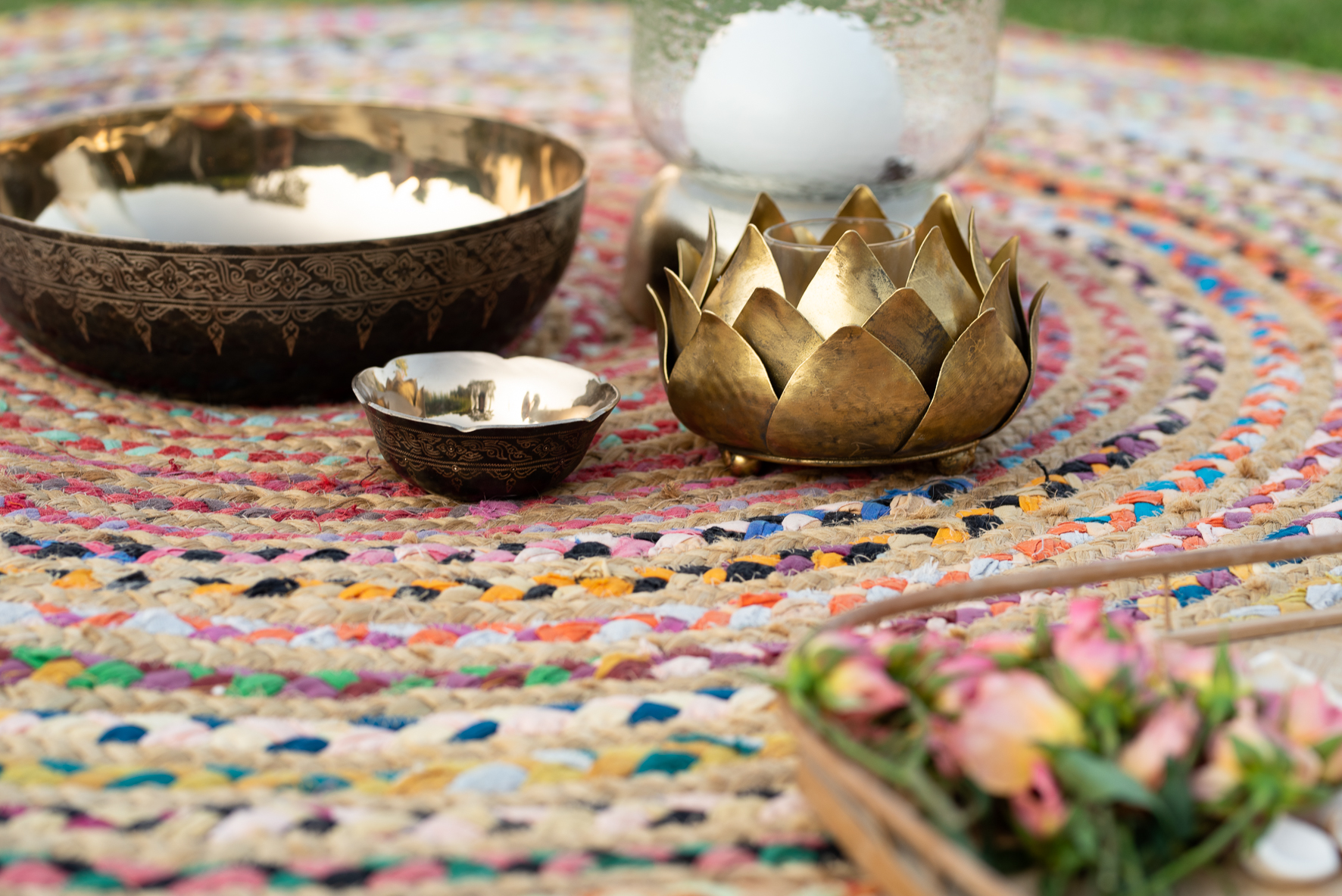 Singing bowls and a lotus candle
